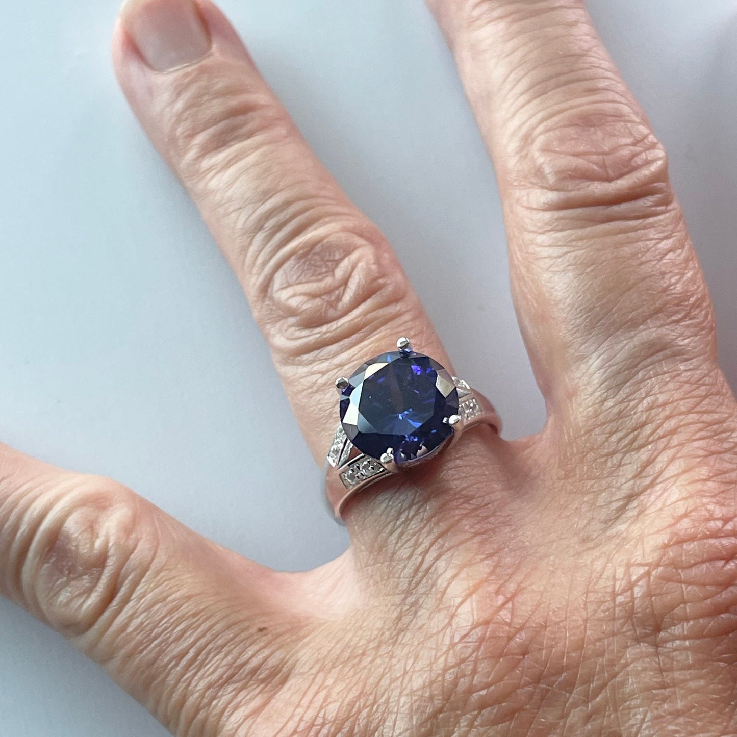 Tanzanite CZ Sterling Silver Engagement Ring: Clear CZ Accents