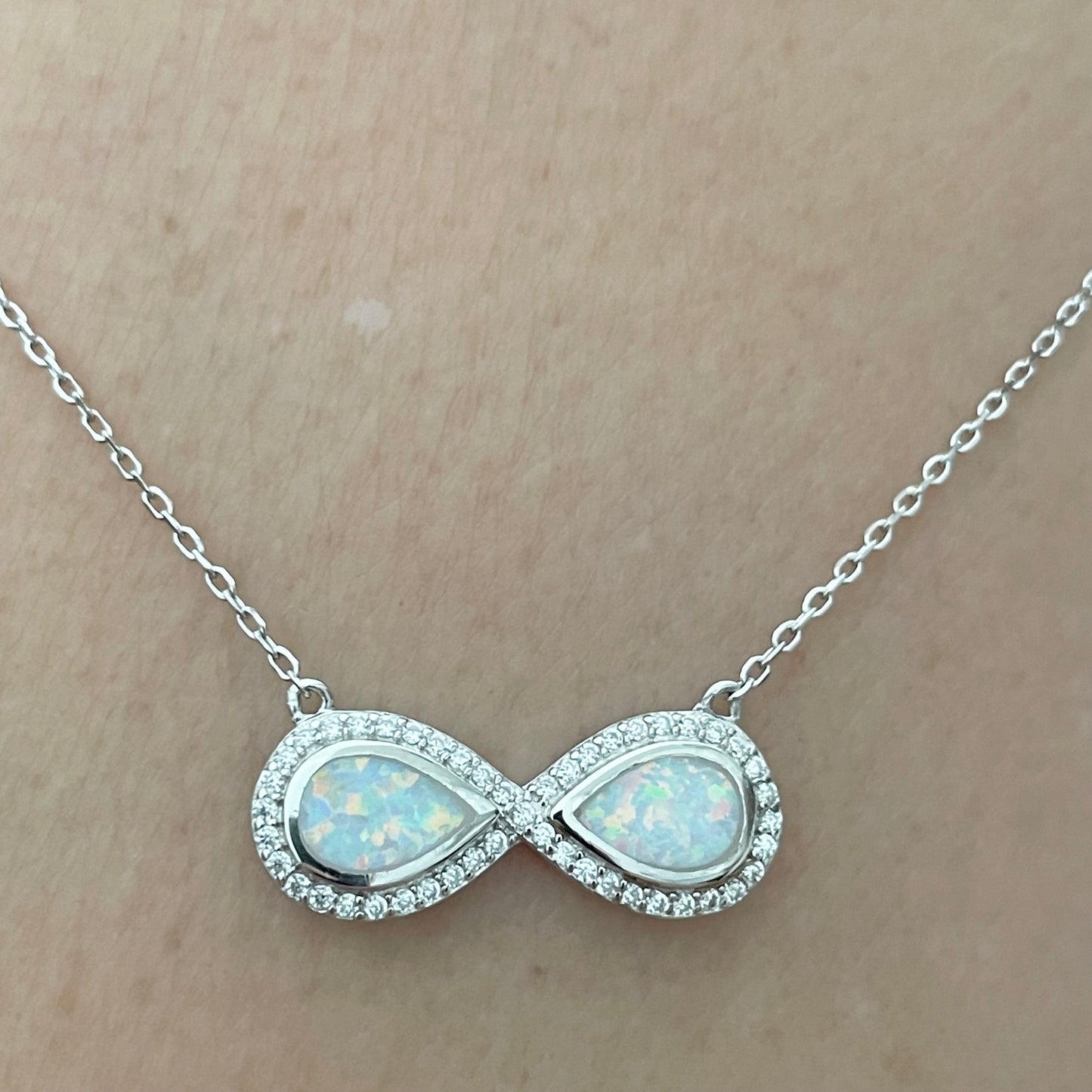 Fire Opal Sterling Silver Circle Pendant Necklace: CZ Accent