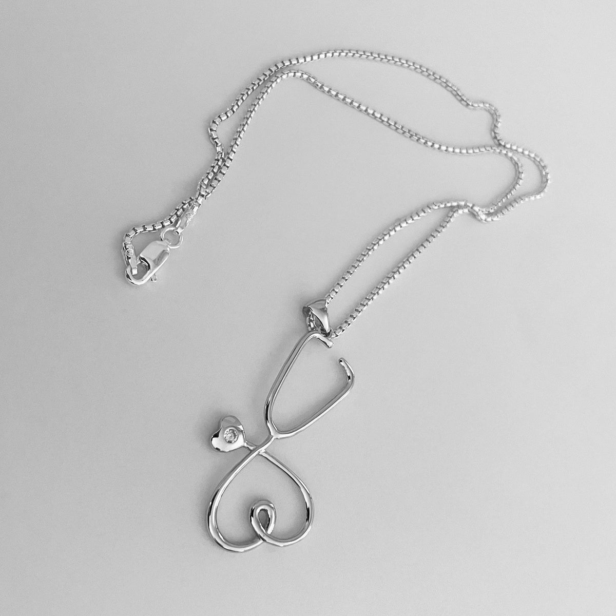 Sterling Silver Heart Stethoscope Necklace: CZ Nurse Pendant