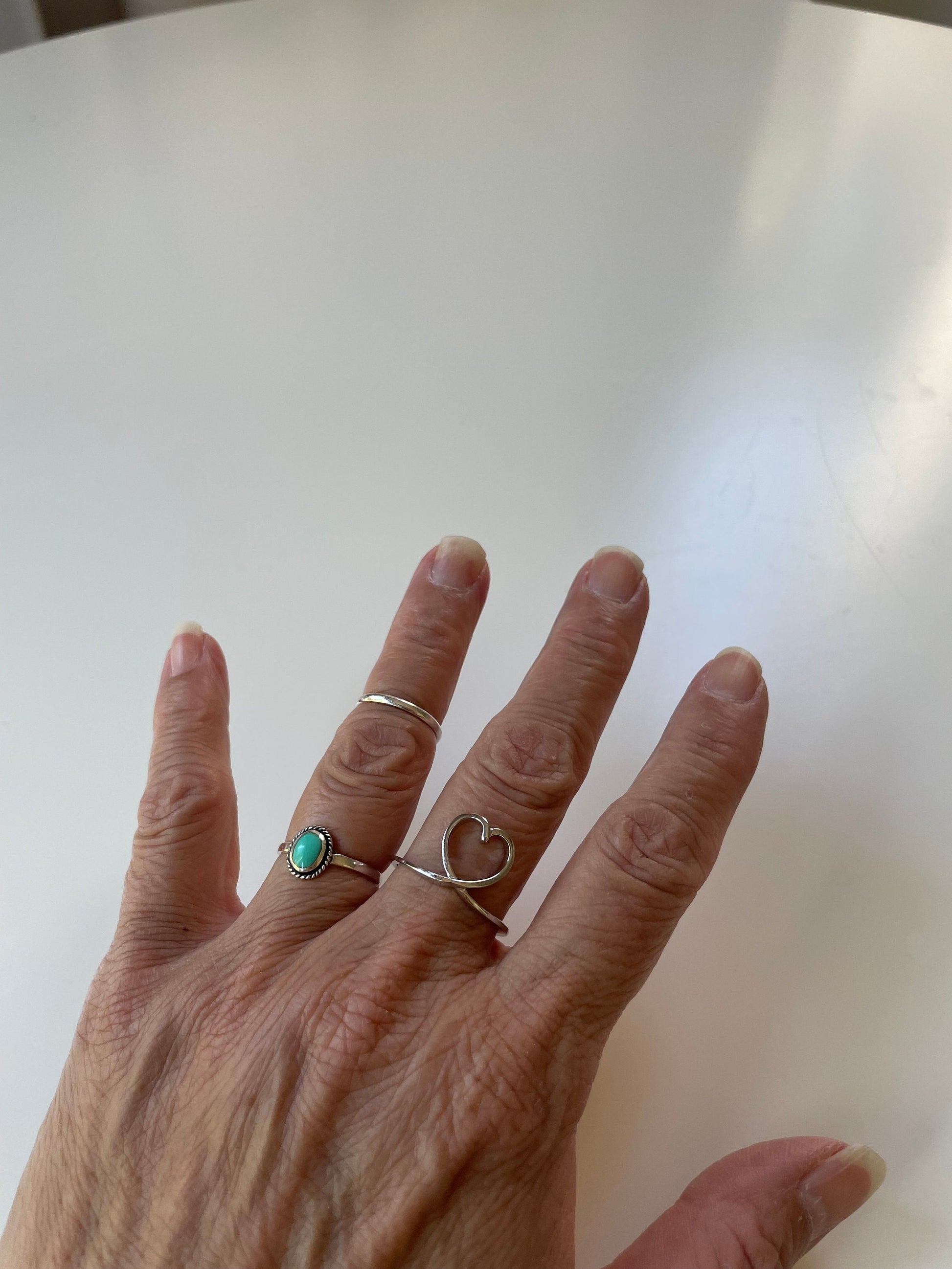 Sterling Silver Heart Loop Ring: Rhodium Plated Promise Ring