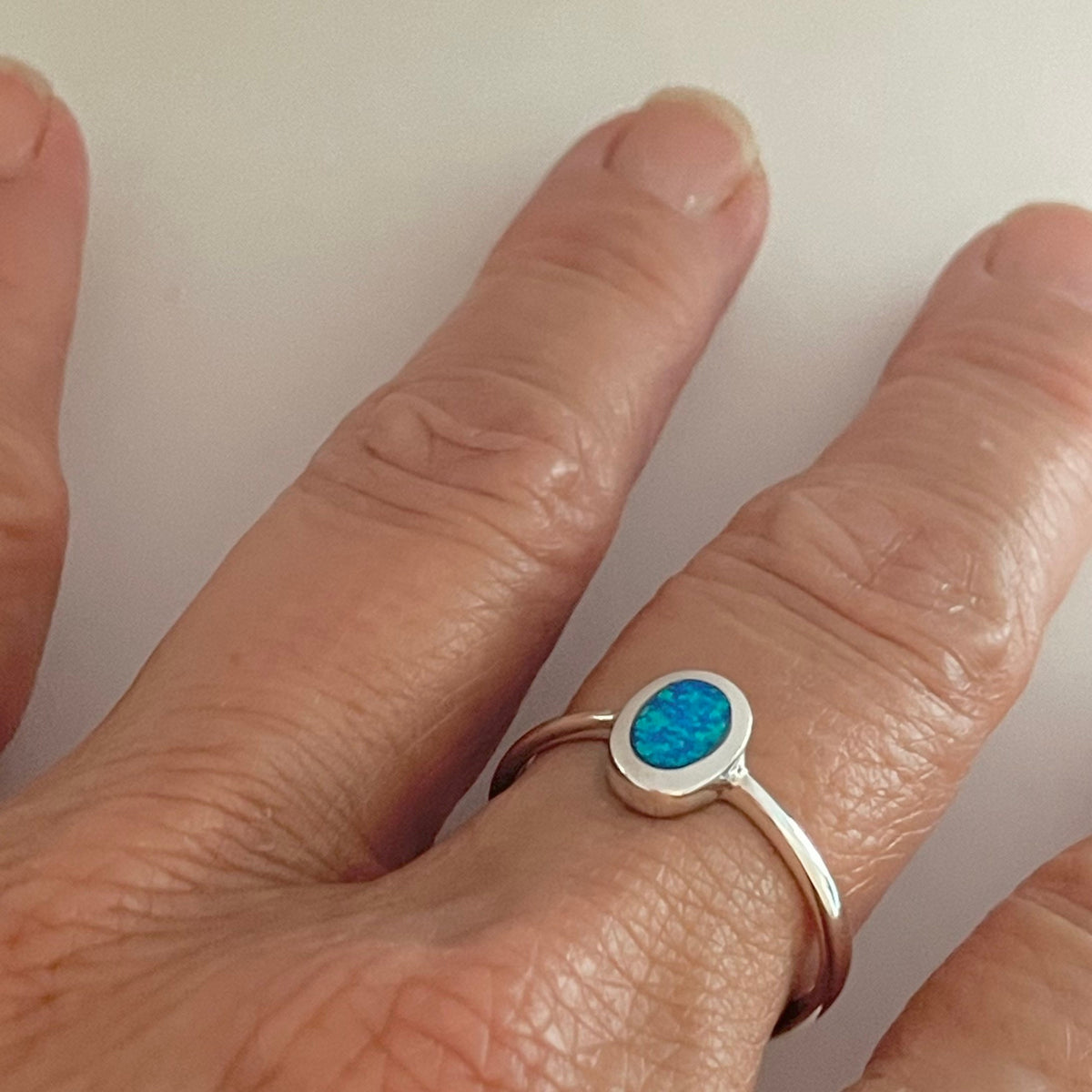 Sterling Silver Oval Blue Lab Opal Ring: Boho Solitaire