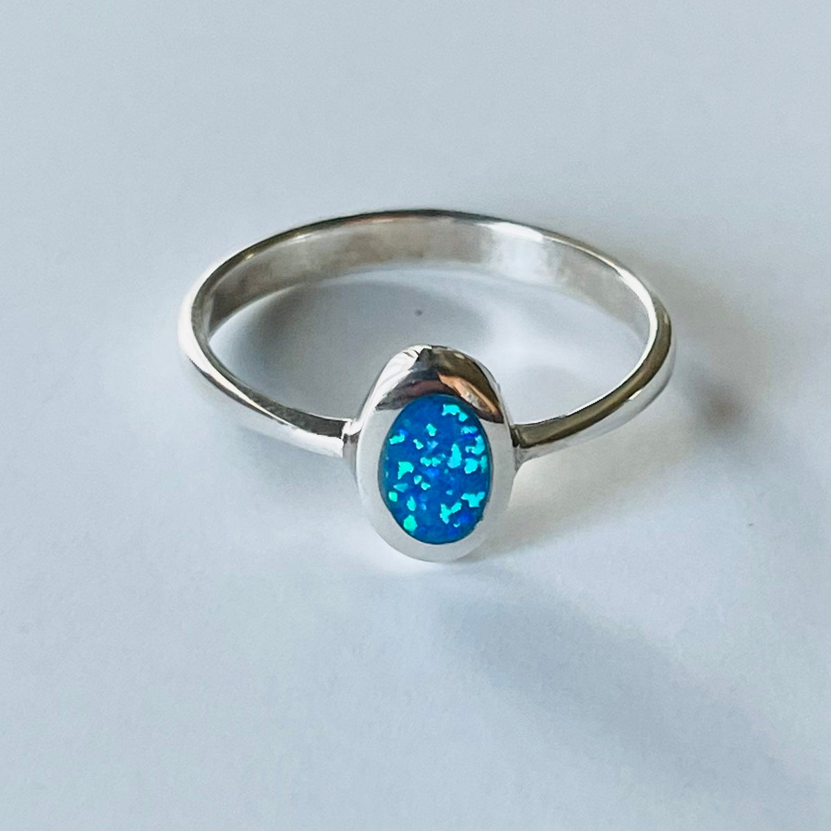 Sterling Silver Oval Blue Lab Opal Ring: Boho Solitaire