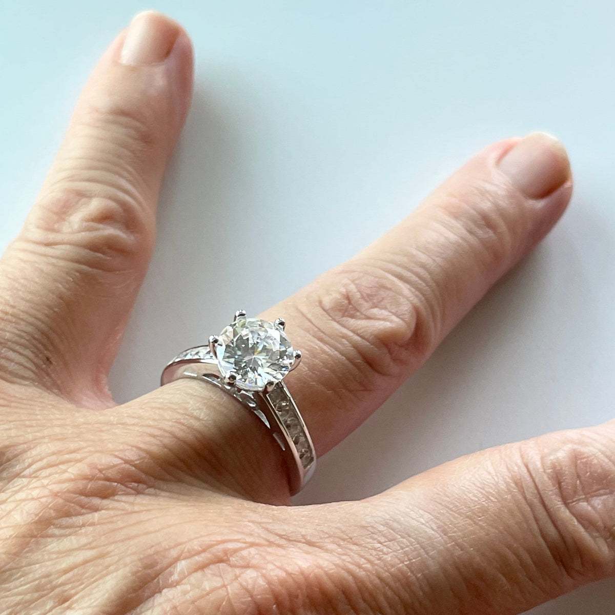 Sterling Silver CZ Solitaire Ring: Promise Wedding Band