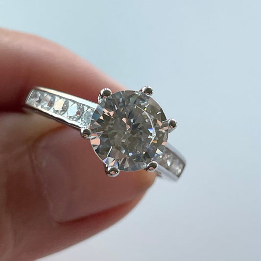 Sterling Silver CZ Solitaire Ring: Promise Wedding Band