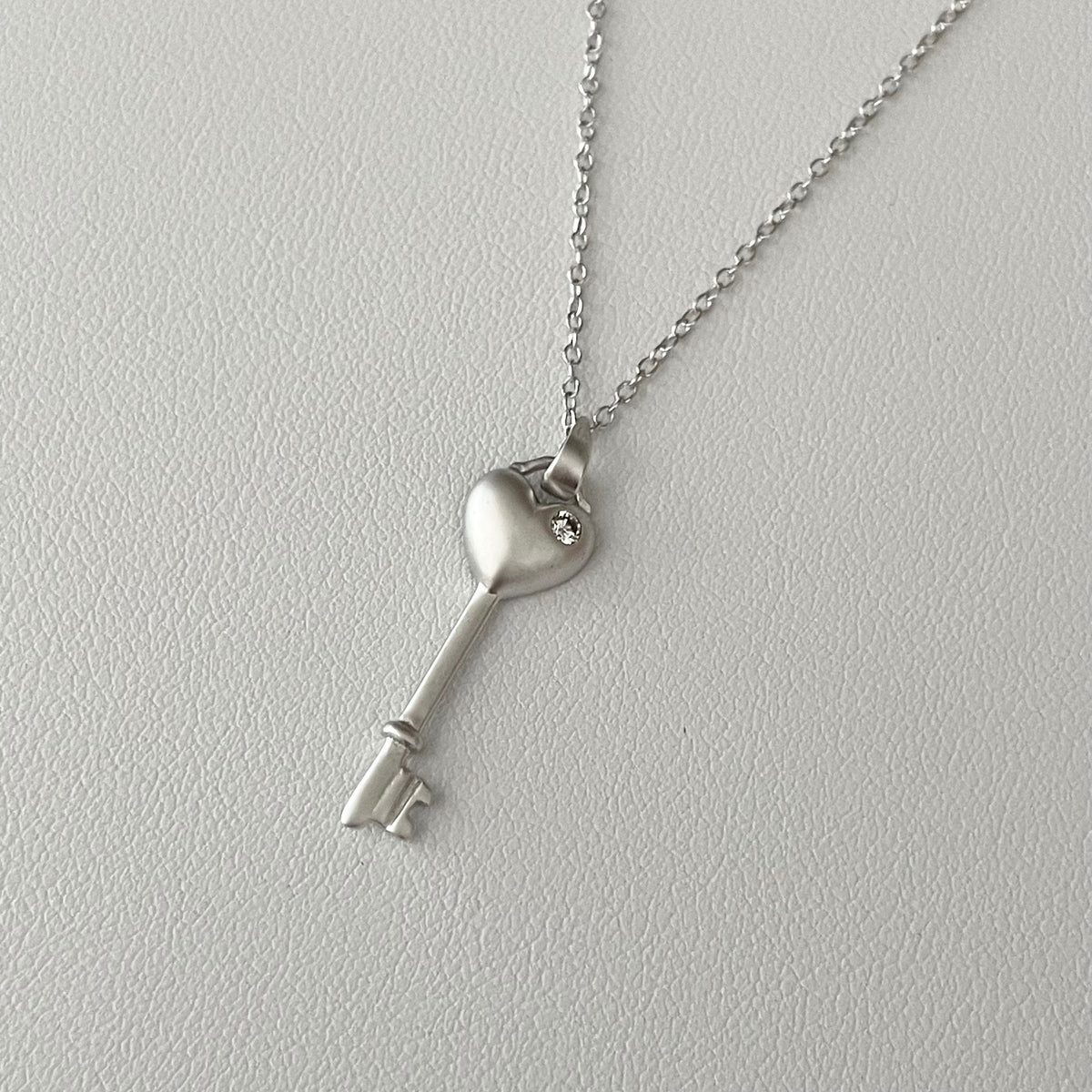 Sterling Silver CZ Heart Key Pendant Necklace: Love Token