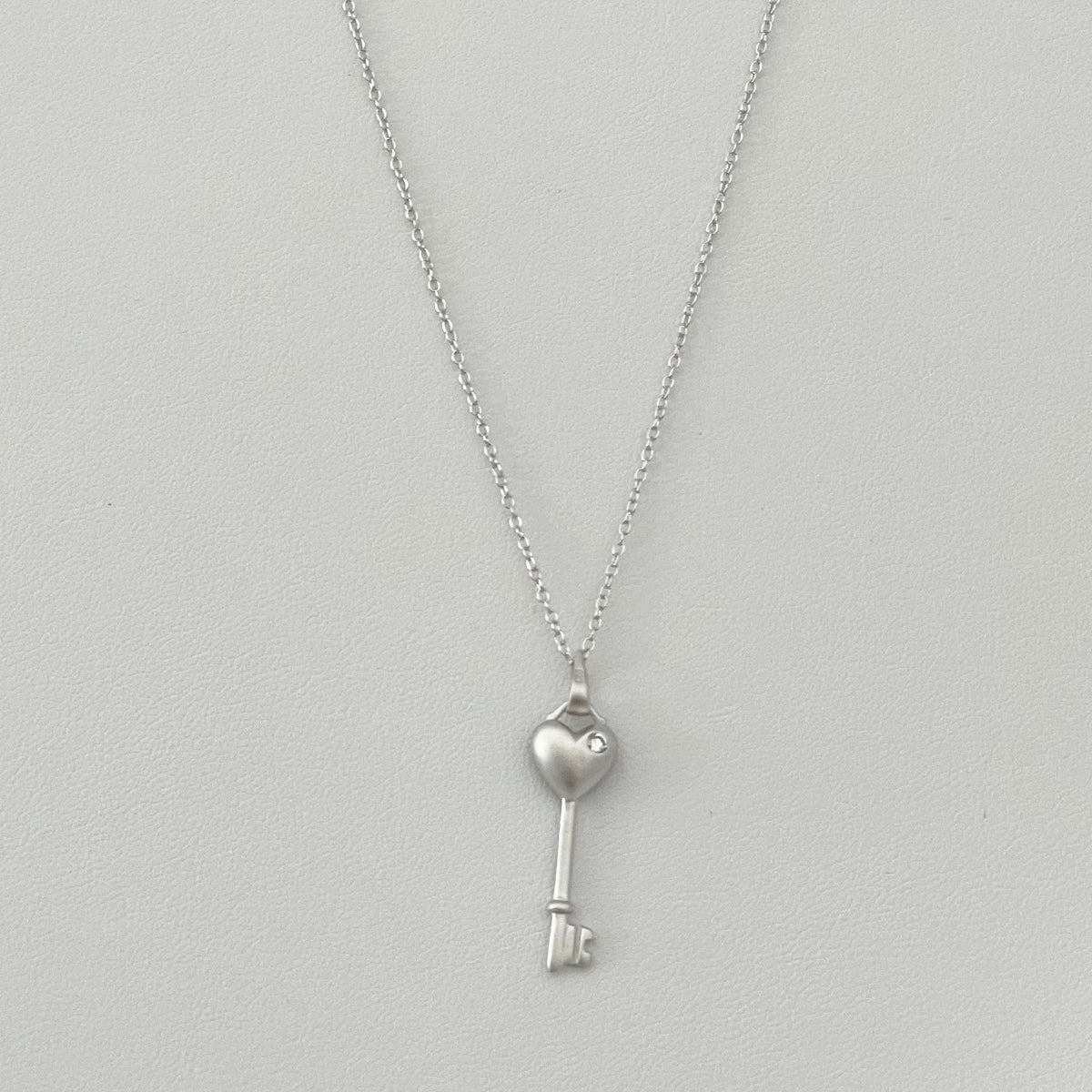 Sterling Silver CZ Heart Key Pendant Necklace: Love Token
