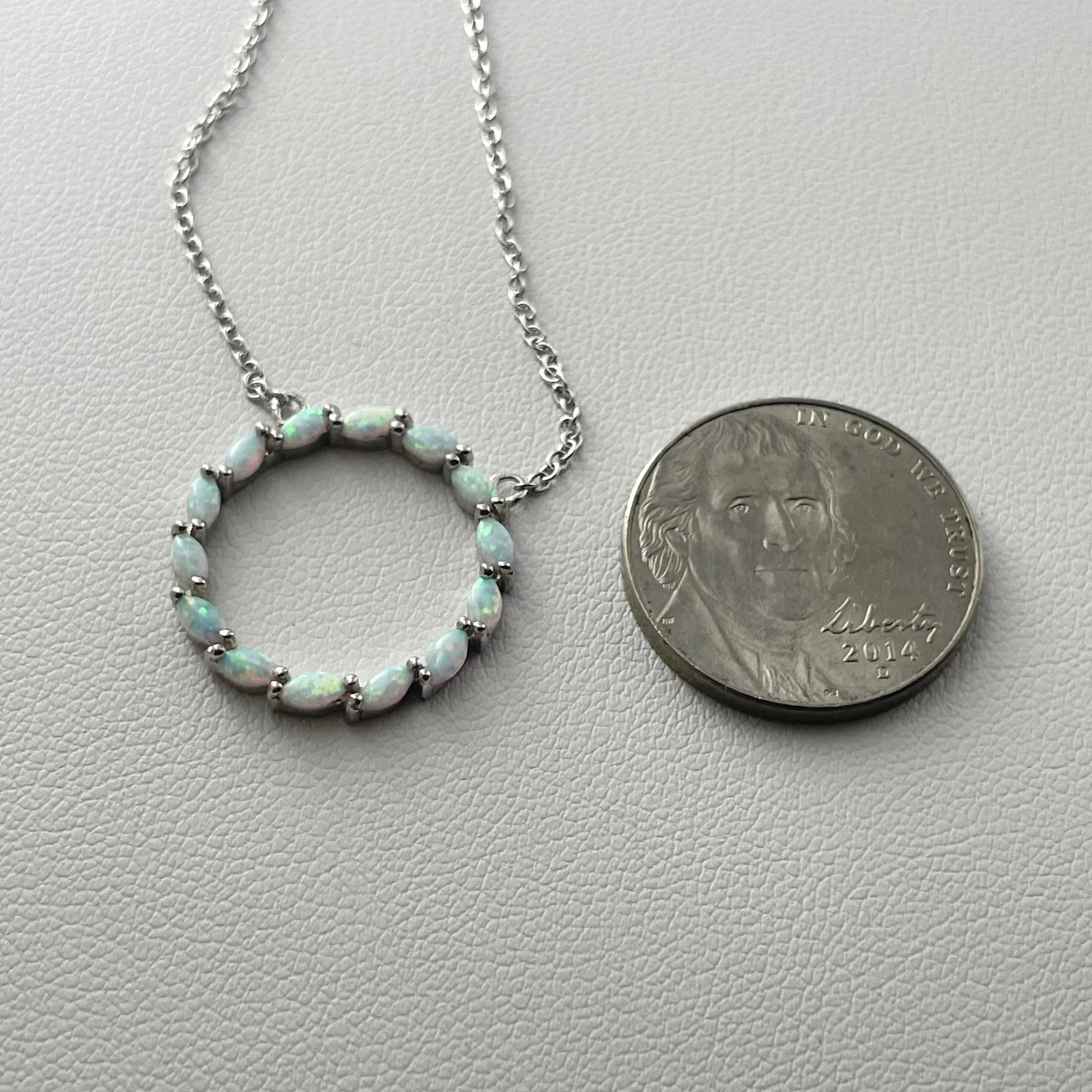 Fire Opal Sterling Silver Circle Pendant Necklace: CZ Accent