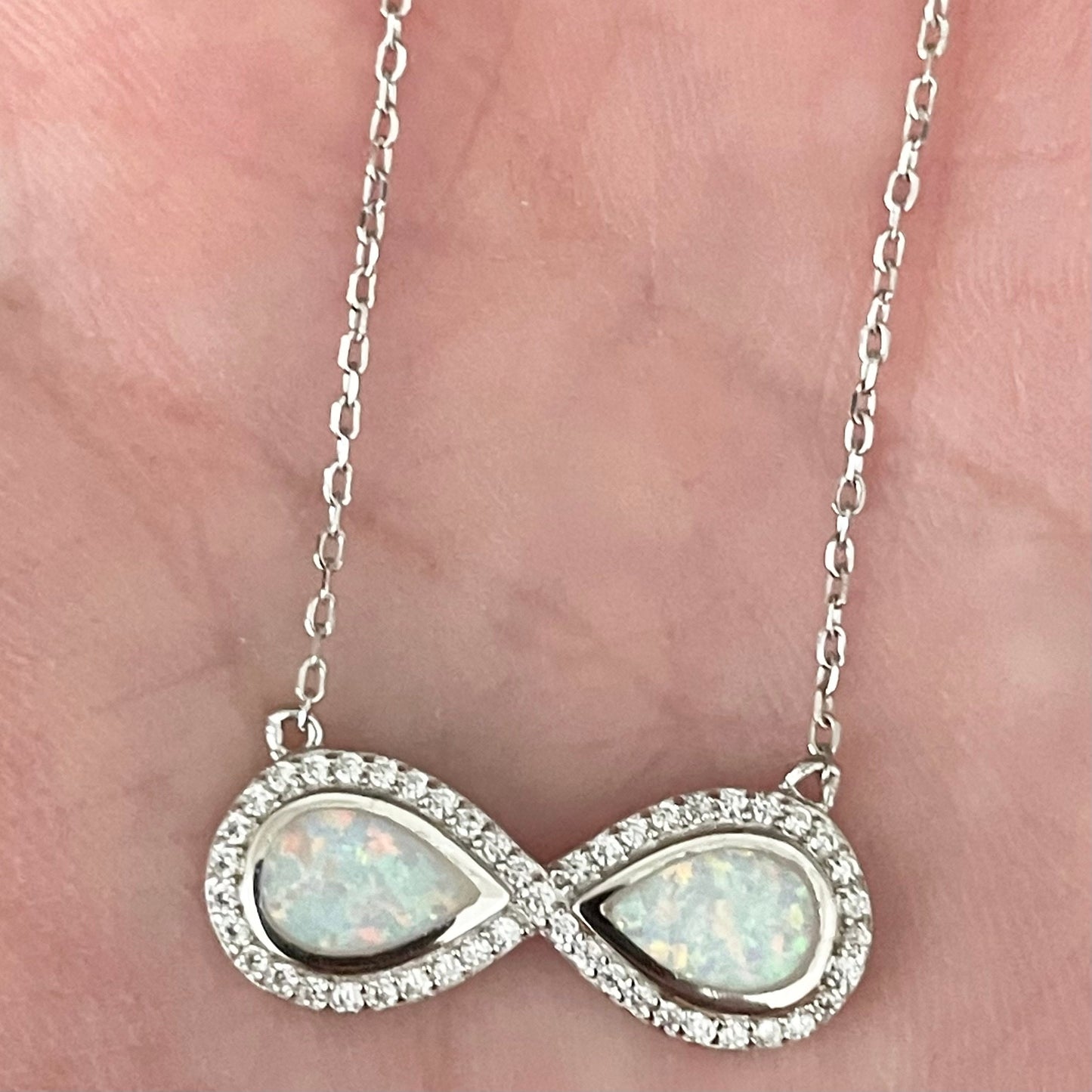 Fire Opal Sterling Silver Circle Pendant Necklace: CZ Accent