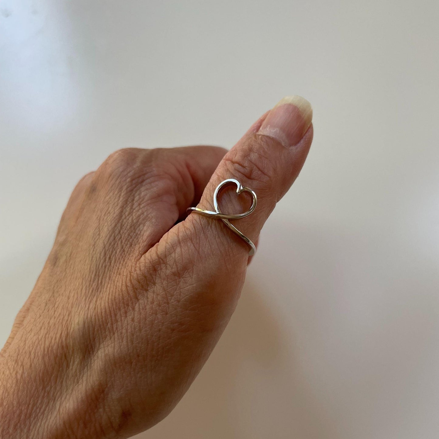 Sterling Silver Heart Loop Ring: Rhodium Plated Promise Ring