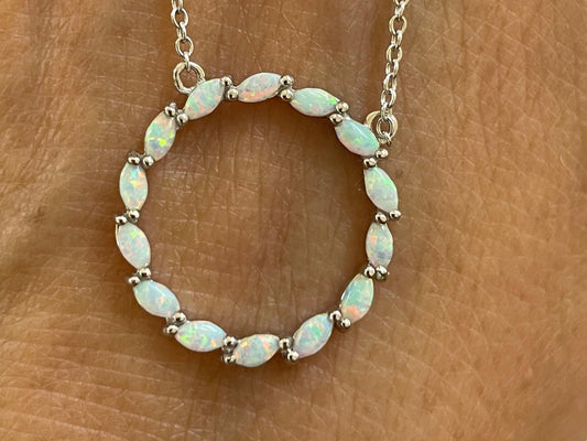 Fire Opal Sterling Silver Circle Pendant Necklace: CZ Accent
