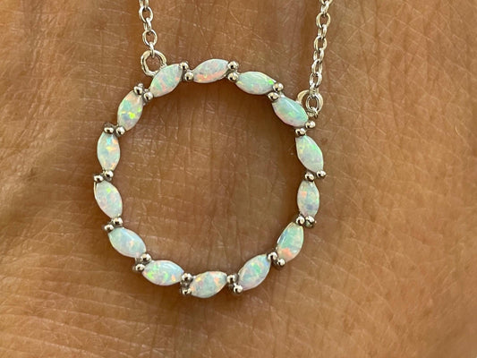 Fire Opal Sterling Silver Circle Pendant Necklace: CZ Accent